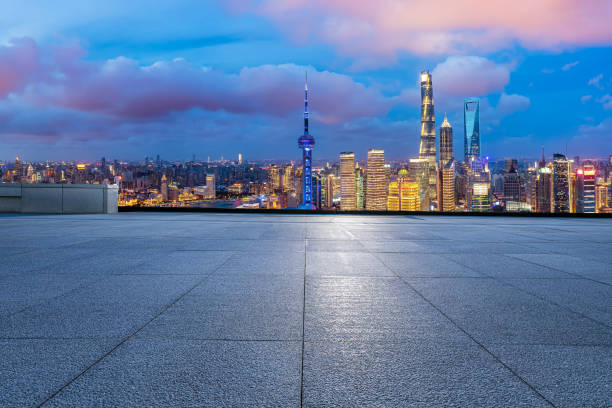 istock Square floor and modern building in Shanghai 1474265611