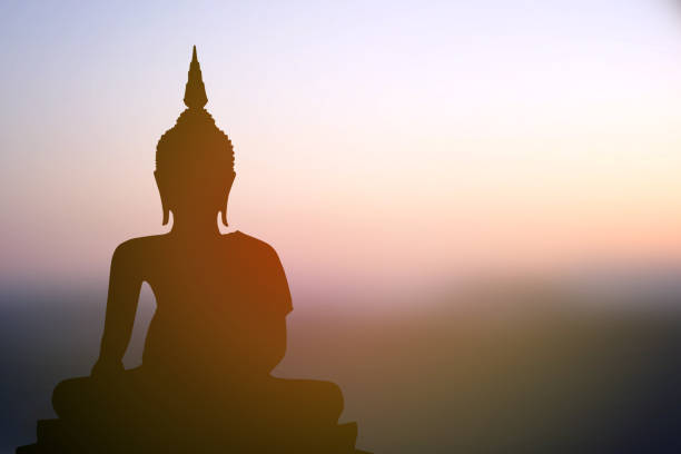istock big buddha silhouette sunset background 1474266163