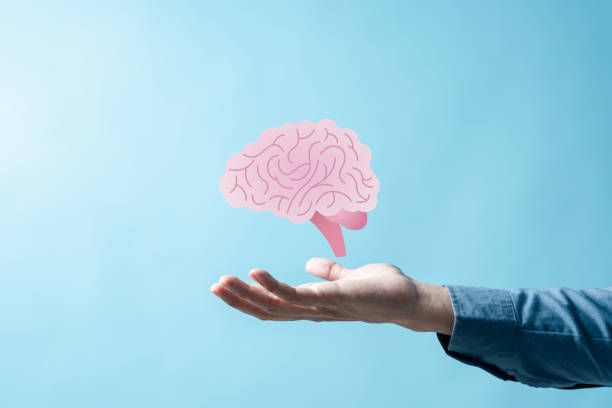 istock Hand holding virtual human brain icon, idea creative intelligence thinking or Awareness of Alzheimer, Parkinson's disease, dementia, stroke, seizure or mental health. Neurology and Psychology care. 1474270958