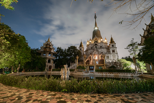Beautiful night at Buu Long Pagoda with nice architecture. This considered wonder of the world. A peacefull place to calm your mind and soul, Buu Long Pagoda is frequented by tourists because of its unique architecture. Built in 1942 with a mixed architecture of India, and Myanmar, Thailand, Laos, and of course Viet Nam.