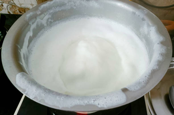 istock Cows milk boiled and overflowing. Boiling milk 1474274268