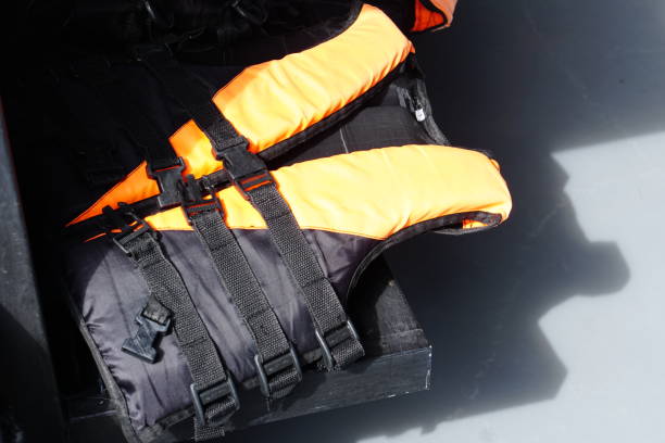 istock Life jackets for tourists in rafts 1474281672