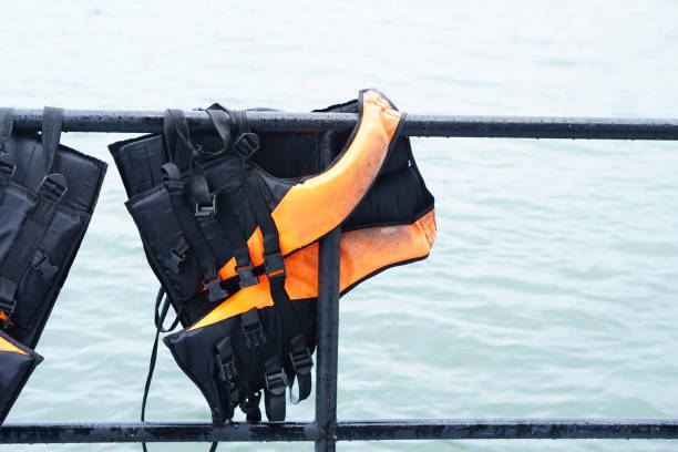 istock Life jackets for tourists in rafts 1474281909