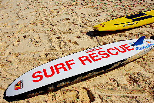 North Bondi Beach, New South Wales, Australia - April 8, 2007: A “SURF RESCUE” surfboard used by the North Bondi Surf Life Saving Club lies on North Bondi Beach awaiting use in an emergency.