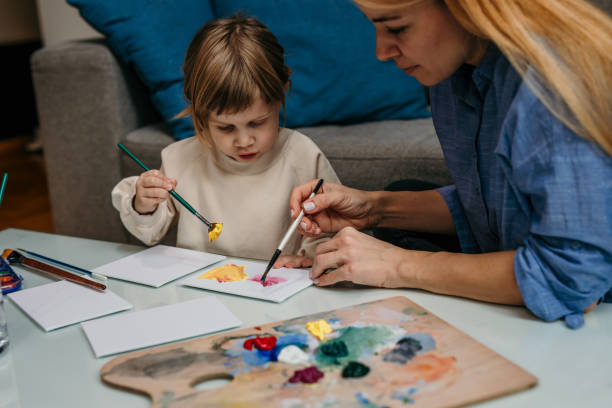 istock Painting with my mom 1474293438