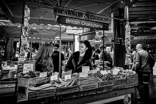 London, UK, July 14, 2017: food vendors at Borough Market