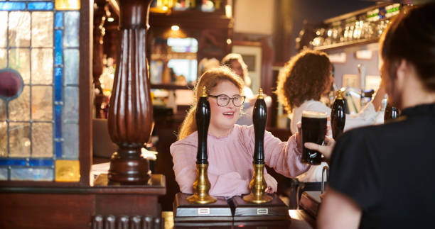 istock teenager working in a pub 1474306433