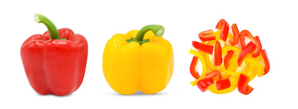istock Red and yellow bell peppers with chopped isolated on white 1474307983