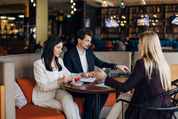 istock Ambitious candidate discusses goal and work plan with HR experts during job interview 1474311772