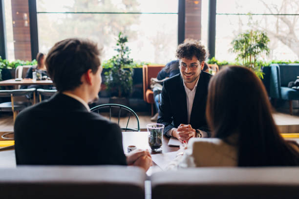 istock Front view of cheerful confident man at job interview 1474312147