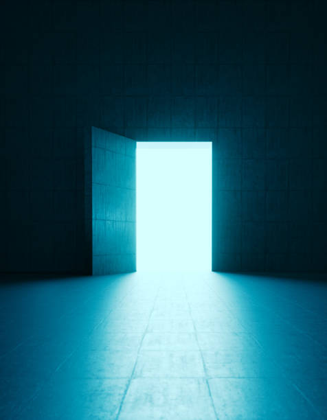 Human crowd waiting before a glowing door on concrete wall. Vertical composition with copy space.
