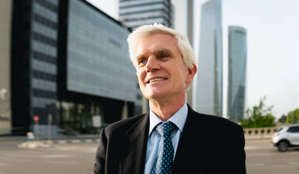 istock Business successful senior man outside enterprise office 1474314870