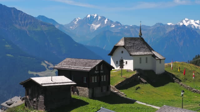 A church and a village Bettmeralp, Switzerland