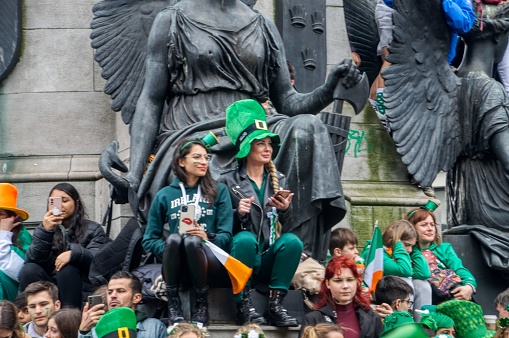 People watching the st Patricks day parade on o connel street Dublin Ireland march 17 2023 saint patricks day