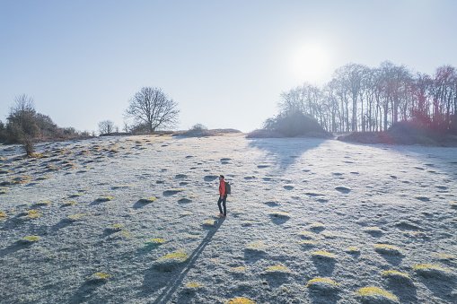 hiker walking in St. Catherine's Hill, Winchester, Hampshire, England, Winter daytime