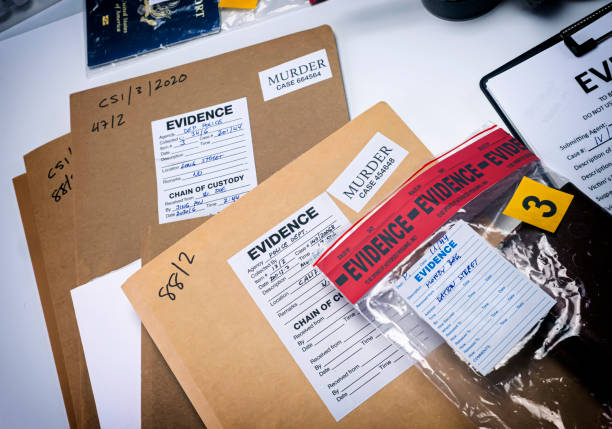 istock Files and evidence bag in a crime lab, conceptual image 1474317090
