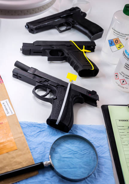 istock various sealed automatic pistols in crime lab, crime investigation, concept image 1474319302