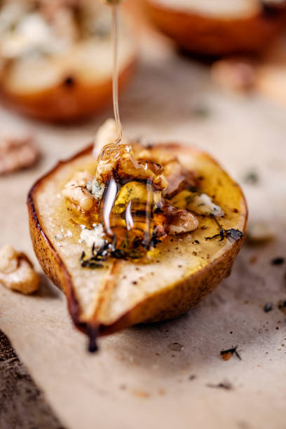 Baked Pear with Gorgonzola Cheese stock photo