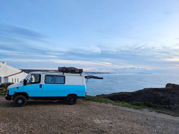 istock Camping van ocean cliff Portugal 1474320355