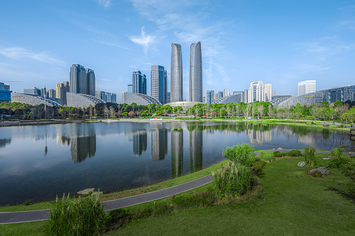 Yongsan, Seoul, South Korea March 30th, 2018 : A view of high rise residential district through the pond in front of the National Museum at Yongsan Family Park, Seoul, South Korea.