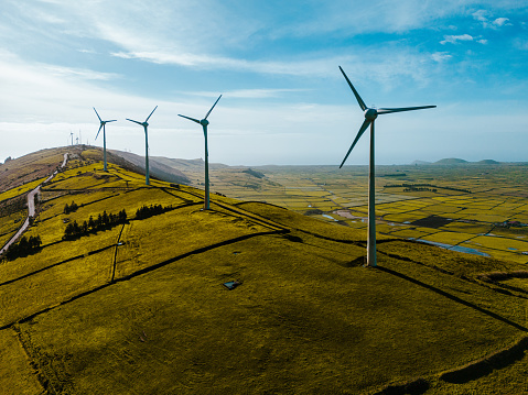 Aerial view of the wind turbine on the beautiful green Terceira Island of Azores Archipelago, in Atlantic Ocean, Portugal.