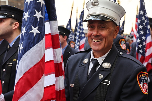 New York, New York - March 17, 2023: Members of the New York City Fire Department Color Guard pose for photos before marching up Fifth Avenue during the St. Patrick's Day Parade in New York on March 17, 2023. (Photo: Gordon Donovan)