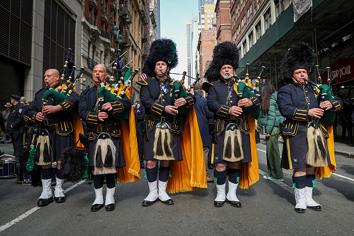 New York, New York - March 17, 2023: The NYPD Emerald Society Pipes & Drums rehearse before performing in the St. Patrick's Day Parade, March 17, 2023, in New York. (Photo: Gordon Donovan)