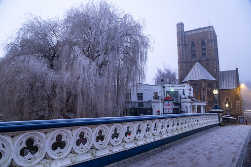 Famous place in Guildford Town Bridge The White House Pub and St Nicolas Parish Church frost cold morning Guildford Surrey England Europe
