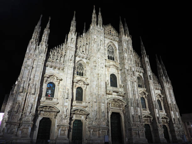 istock Duomo Cathedral magnificent view from below at night, Milan, Italy 1474331289