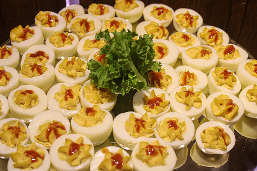 Boiled eggs decorated for buffet