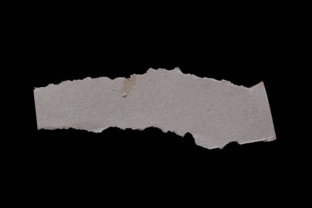 istock Torn paper piece on a black background 1474336503