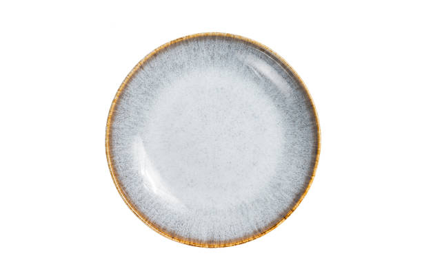istock Food cooking background, empty white craft plate on table. Table setting.   Isolated on white background 1474336809