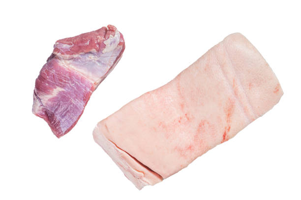 istock Raw pork belly with skin on a butcher table.  Isolated on white background 1474337542