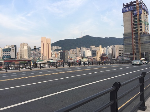 City road with buildings in background in Busan, South Korea