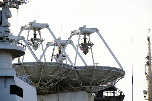 Radar dishes are located deck ship