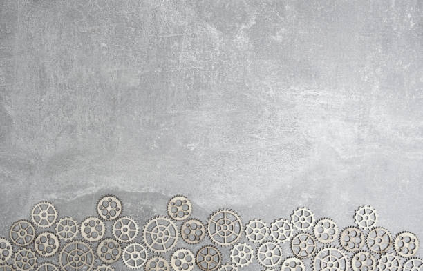 gray concrete background with gears and copy space. - bicycle gear fotos imagens e fotografias de stock