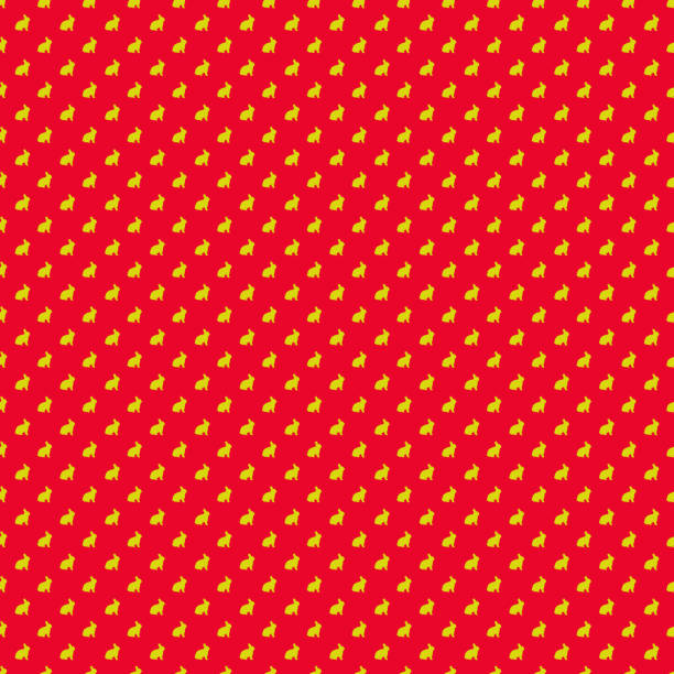 istock Seamless Pattern of Dull Gold Rabbits on Candy Apple Red Background 1474344458