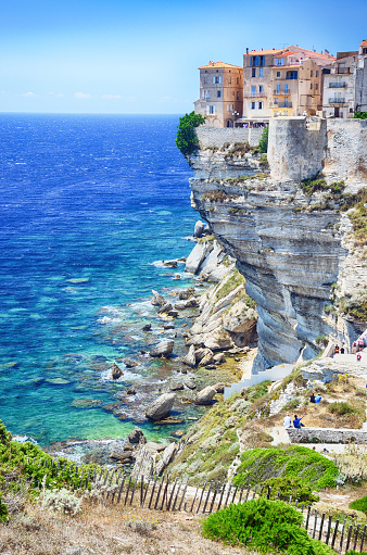 Houses of Bonifacio atop steep cliffs above the Mediterranean sea, Corsica, France
