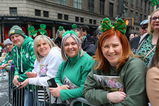 New York, New York - March 17, 2023: People are fashionably dressed in clothing for the St. Patrick's Day Parade; March 17, 2023 in New York. (Photo: Gordon Donovan)