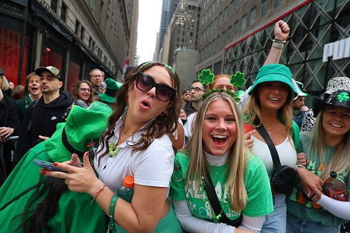 New York, New York - March 17, 2023: People are fashionably dressed in clothing for the St. Patrick's Day Parade; March 17, 2023 in New York. (Photo: Gordon Donovan)