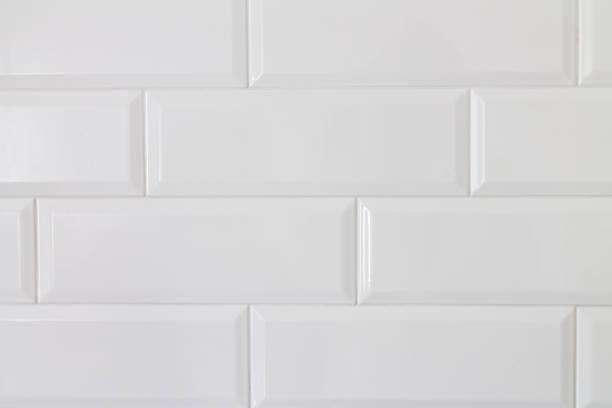istock Background of white ceramic brick tile wall 1474348702