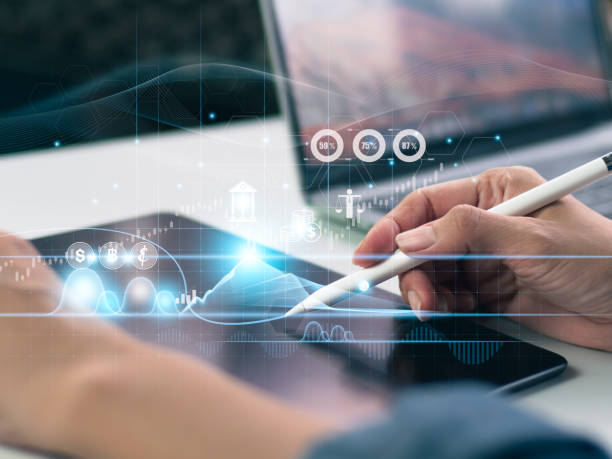 istock Woman uses virtual screen on cell phone to access worldwide network for online banking.E-commerce.Mobile banking apps for online payments, electronic transactions, virtual banks, financial technology. 1474349821