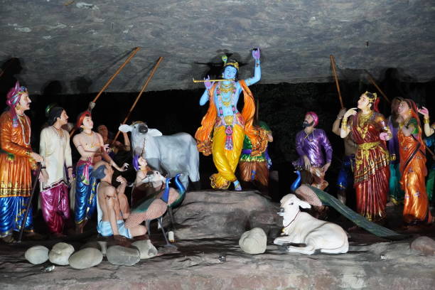 istock krishna lifted mountain on his finger epic scene statue image 1474350266