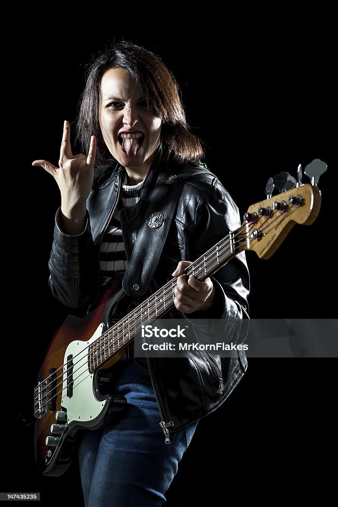 Bassista Rock donna - Foto stock royalty-free di Abbigliamento casual