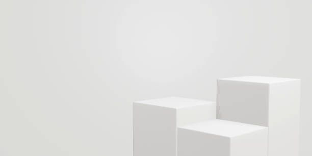 istock empty white podium.3D display podium on white background.Stand Minimal mockup for presentation.Abstract white background concept.Geometric platform show cosmetic product.Stage showcase.3D rendering 1474354259