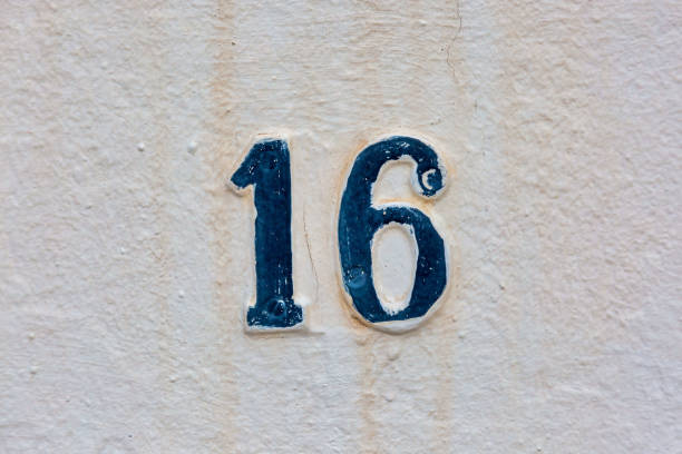 istock Old Weathered House Number 16, Tile on Wall 1474354583