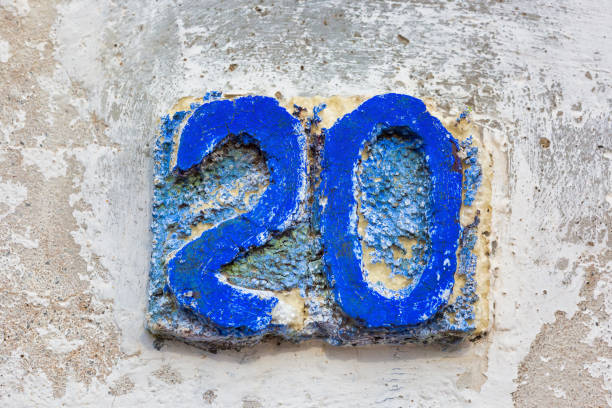 istock Old Weathered House Number 20, Tile on Wall 1474354595