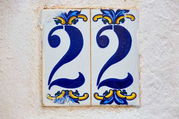 istock Old Weathered House Number 22, Tile on Wall 1474354605