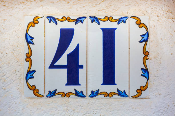 istock Old Weathered House Number 41, Tile on Wall 1474354645