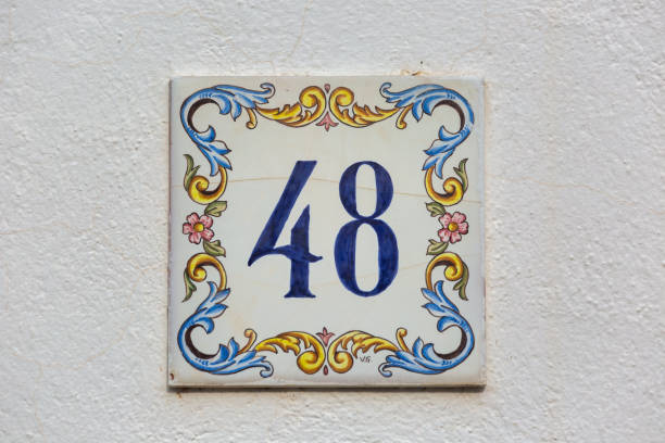 istock Old Weathered House Number 48, Tile on Wall 1474354650